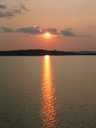 this is a sunset over Round Valley Lake in NJ