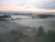 low tree top fog over Frenchtown NJ at sunrise